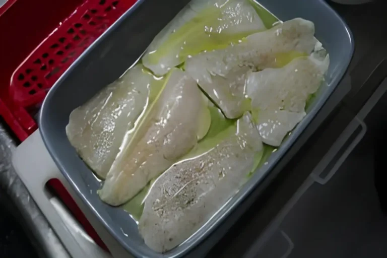 Filetes de pescada no forno preparação